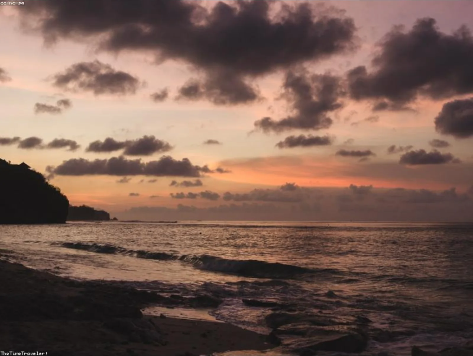 Bingin Beach shoreline at sunset
